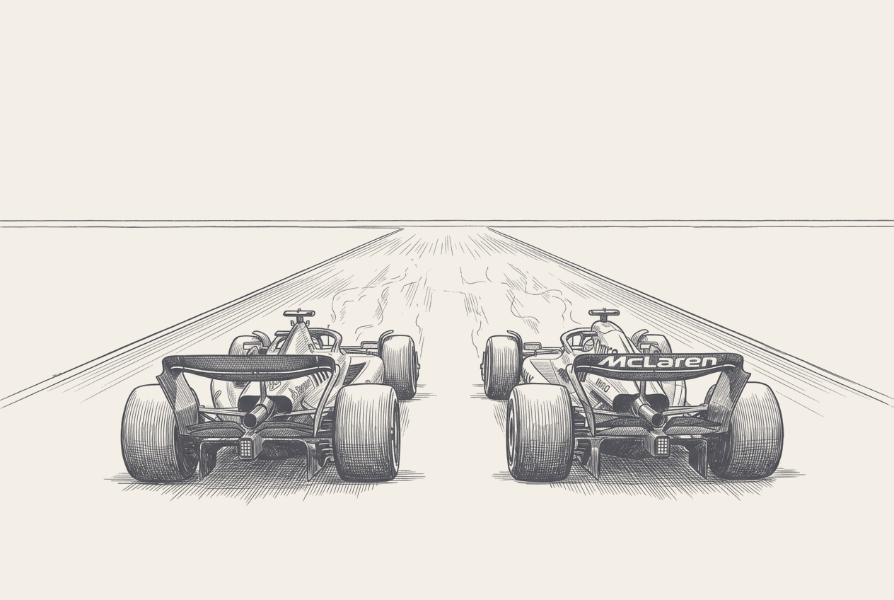 Two-tone hatched-ink illustration of two Formula 1 cars seen from directly behind on a long straight, a Ferrari on the left and a McLaren on the right running side by side with daylight between them, heat haze off the tarmac and the straight converging toward a distant vanishing point under an empty sky.