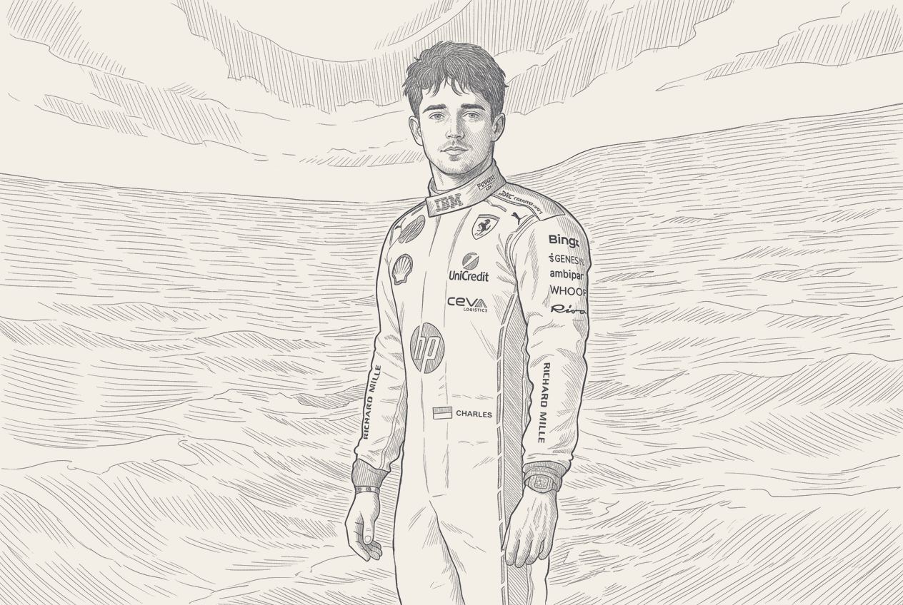 Charles Leclerc in 2026 Ferrari race overalls standing in the Monaco pit lane at dawn, the SF-26 under a cover behind him, harbour and apartment towers soft in the background light.